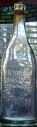 JOHN GUND BREWING COMPANY EMBOSSED BEER BOTTLE