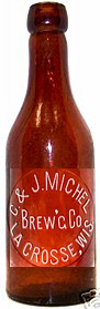 C. & J. MICHEL BREWING COMPANY EMBOSSED BEER BOTTLE