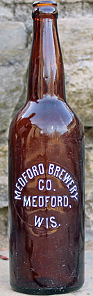 MEDFORD BREWERY COMPANY EMBOSSED BEER BOTTLE