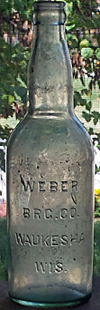 WEBER BREWING COMPANY EMBOSSED BEER BOTTLE