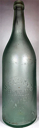 MICHIGAN UNION BREWING COMPANY EMBOSSED BEER BOTTLE