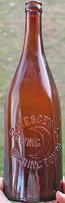 CRESCENT BREWING COMPANY EMBOSSED BEER BOTTLE