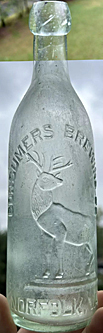 CONSUMERS BREWING COMPANY EMBOSSED BEER BOTTLE